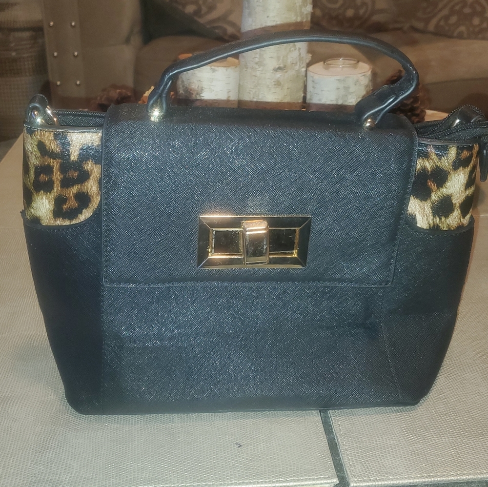 Black purse with leopard sides no brand name